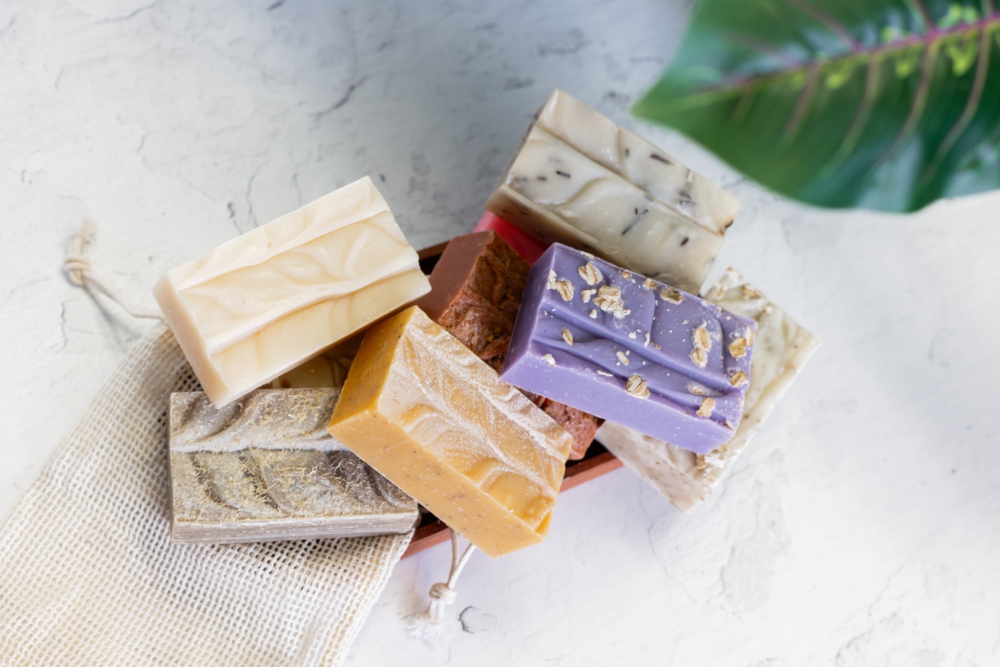 An assortment of wrapped Blue Moon Elise handmade soaps